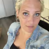 WPF Community - Eine Frau mit kurzen blonden Haaren und blauen Augen blickt in die Kamera.